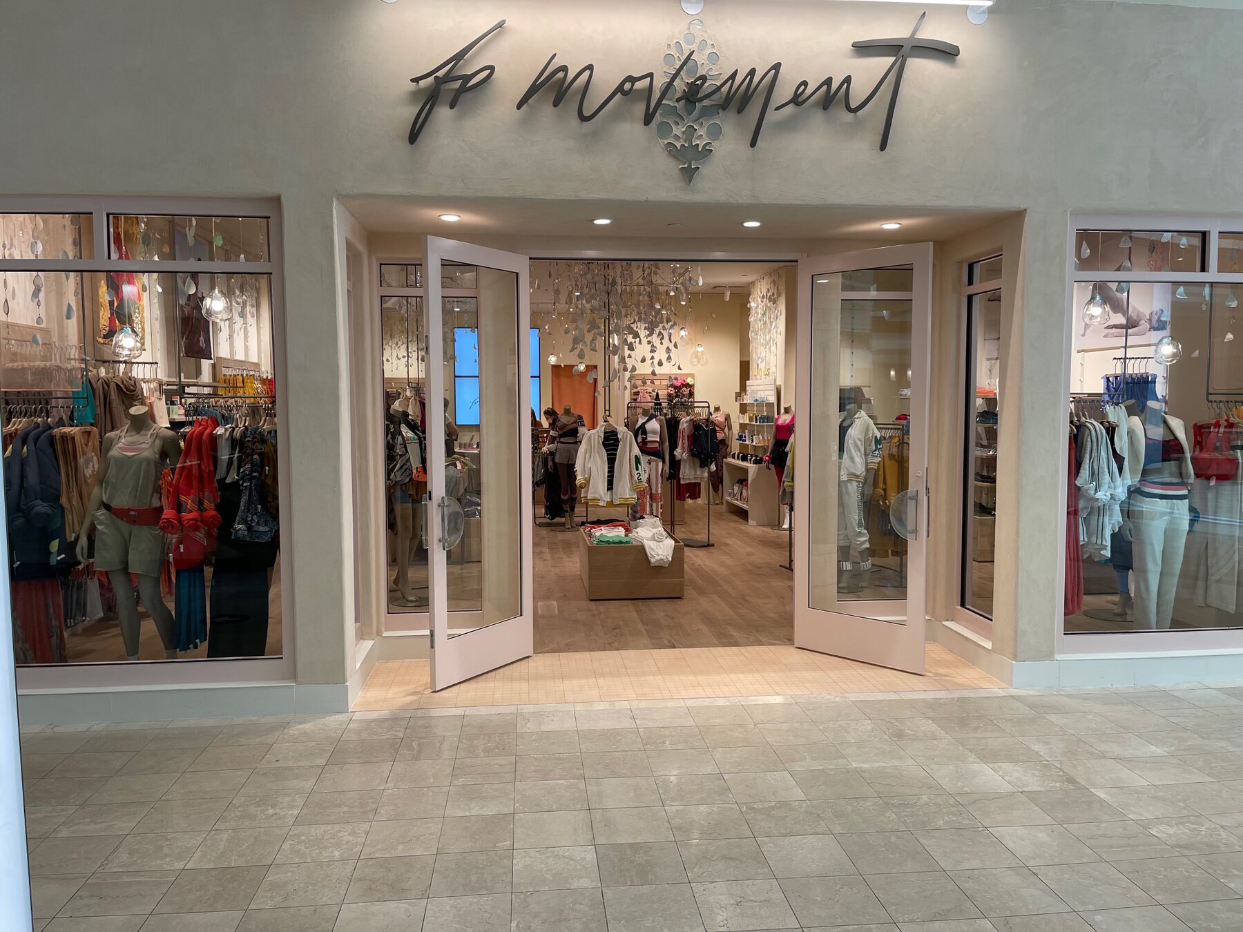 Retail storefront entrance with illuminated signage